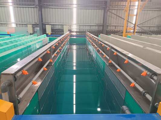 ভালো দাম স্বয়ংক্রিয় 800T/মাস অ্যালুমিনিয়াম অ্যানোডাইজিং প্রোডাকশন লাইন 6500মি সর্বোচ্চ প্রোফাইল দৈর্ঘ্য এবং 10~12µm ফিল্ম পুরুত্ব সহ অনলাইন